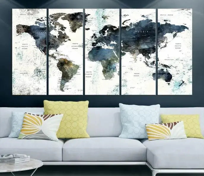 The Modern World Map Canvas Print, a contemporary triptych wall art in blue and white, hangs prominently, offering a global perspective.