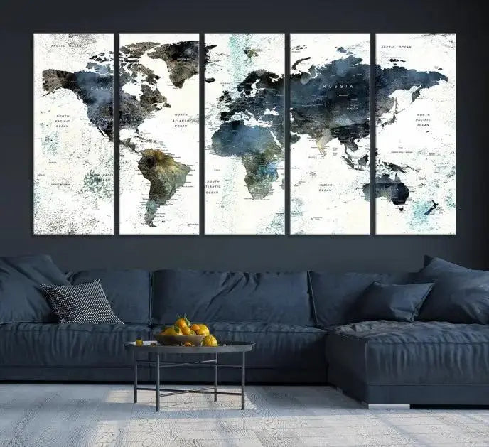 The Modern World Map Canvas Print, a contemporary triptych wall art in blue and white, hangs prominently, offering a global perspective.