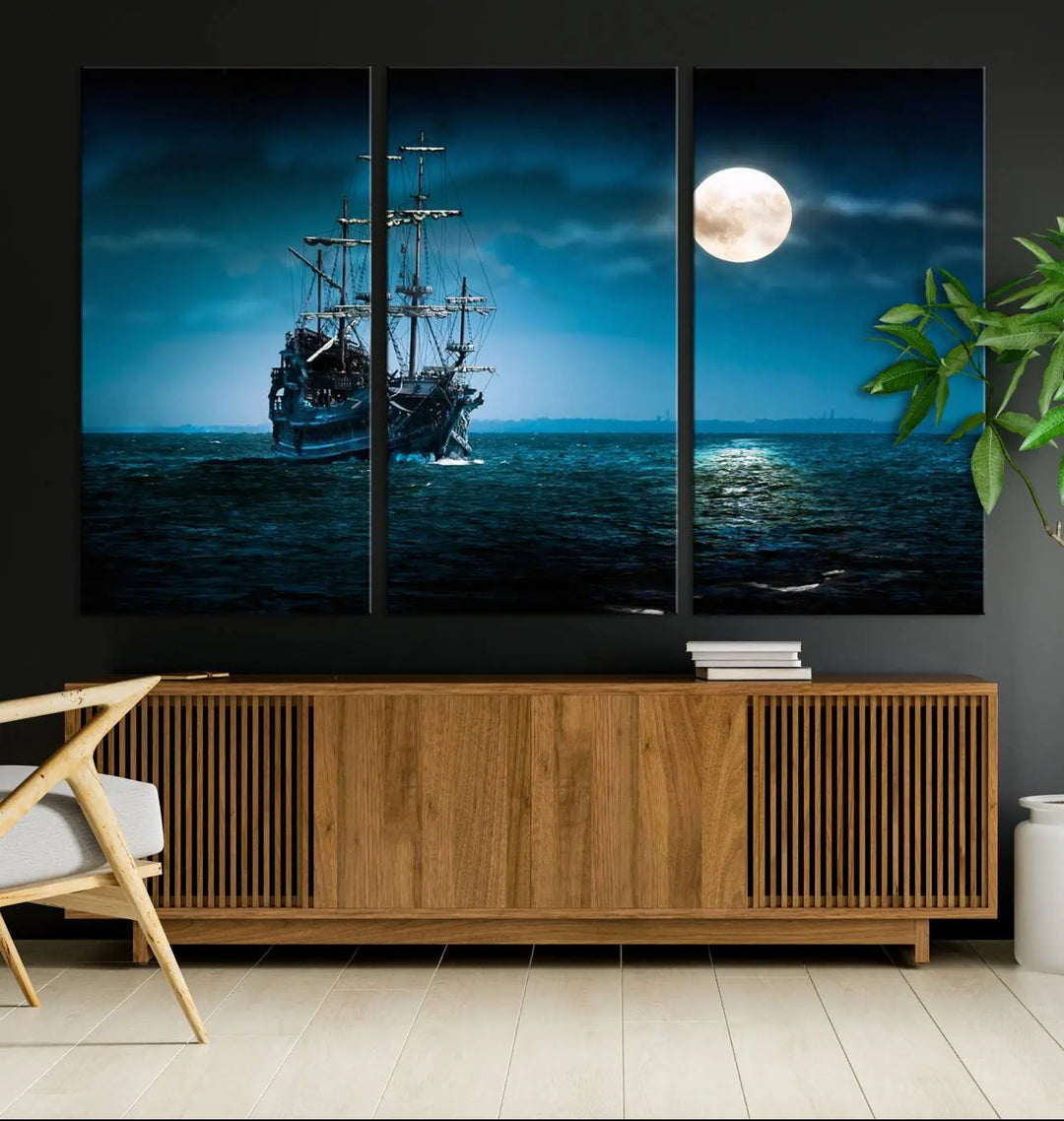 The "Moon and Ship in Ocean at Night Wall Art Canvas Print" features a stunning three-panel depiction of a ship sailing under a full moon. Presented on museum-quality canvas, this ready-to-hang piece is perfect for adding instant allure to any space.