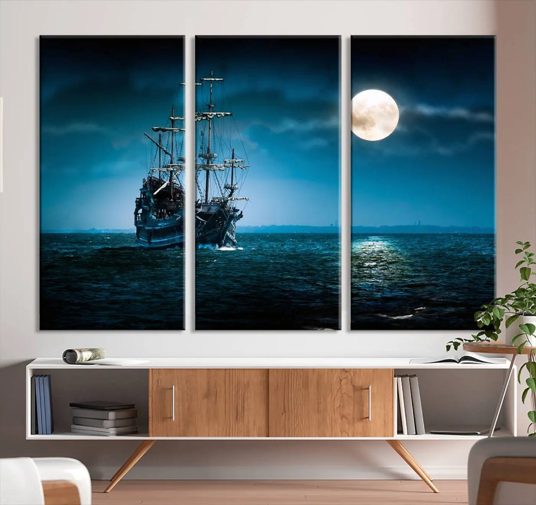 The "Moon and Ship in Ocean at Night Wall Art Canvas Print" features a stunning three-panel depiction of a ship sailing under a full moon. Presented on museum-quality canvas, this ready-to-hang piece is perfect for adding instant allure to any space.