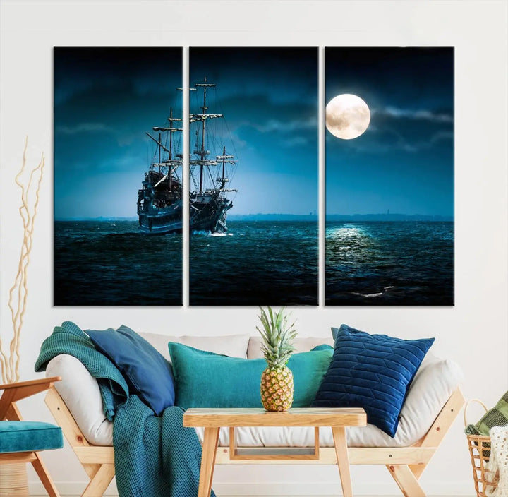 The "Moon and Ship in Ocean at Night Wall Art Canvas Print" features a stunning three-panel depiction of a ship sailing under a full moon. Presented on museum-quality canvas, this ready-to-hang piece is perfect for adding instant allure to any space.