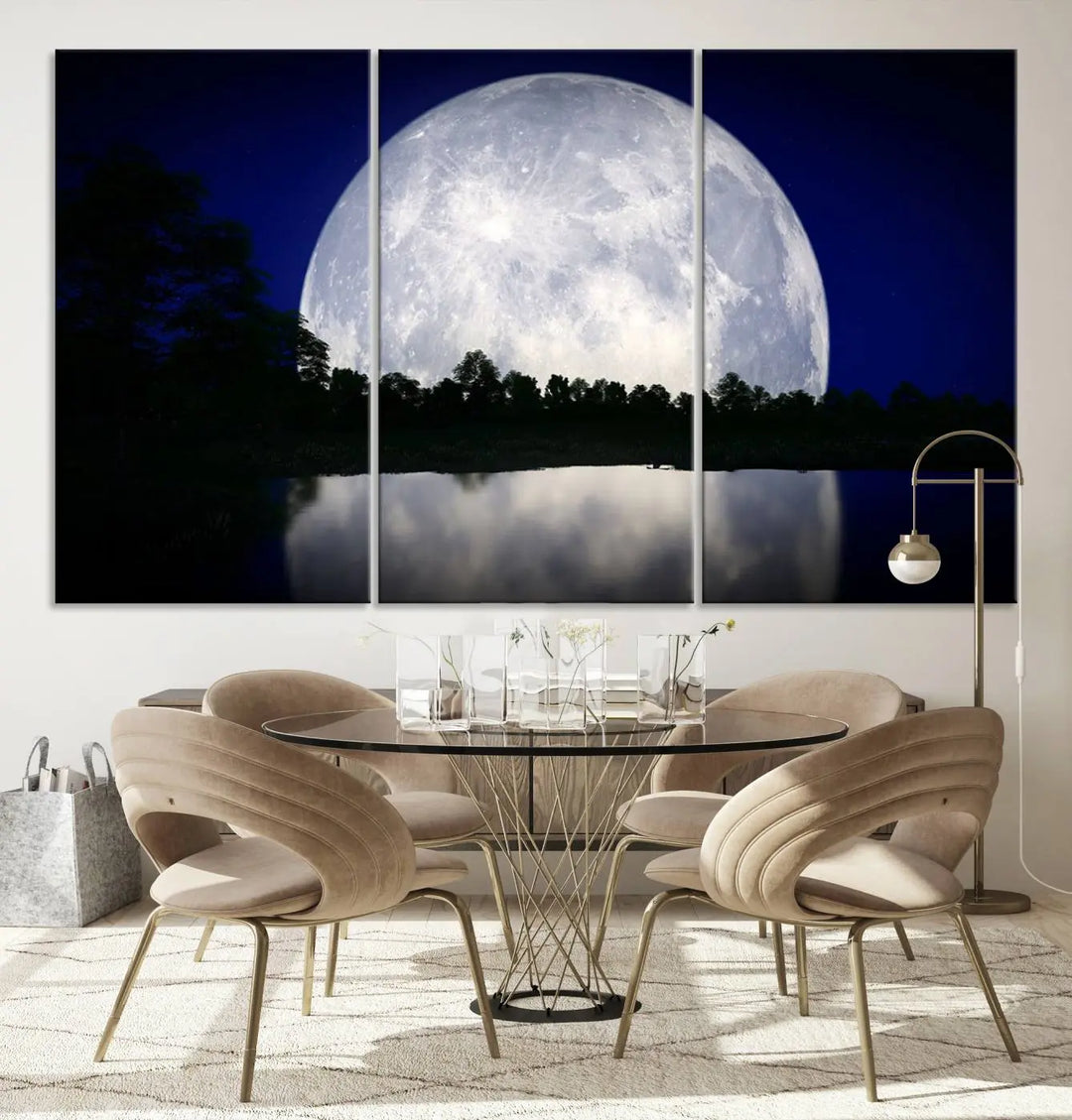 A modern living room showcases a three-panel MoonGlade Wall Art Canvas Print, depicting a moonlit night over a tranquil lake on museum-quality canvases.