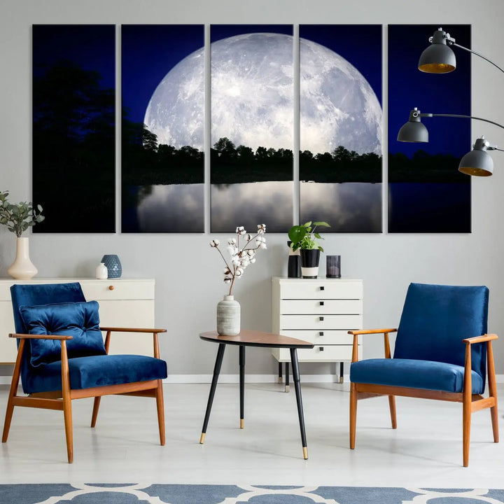 A modern living room showcases a three-panel MoonGlade Wall Art Canvas Print, depicting a moonlit night over a tranquil lake on museum-quality canvases.