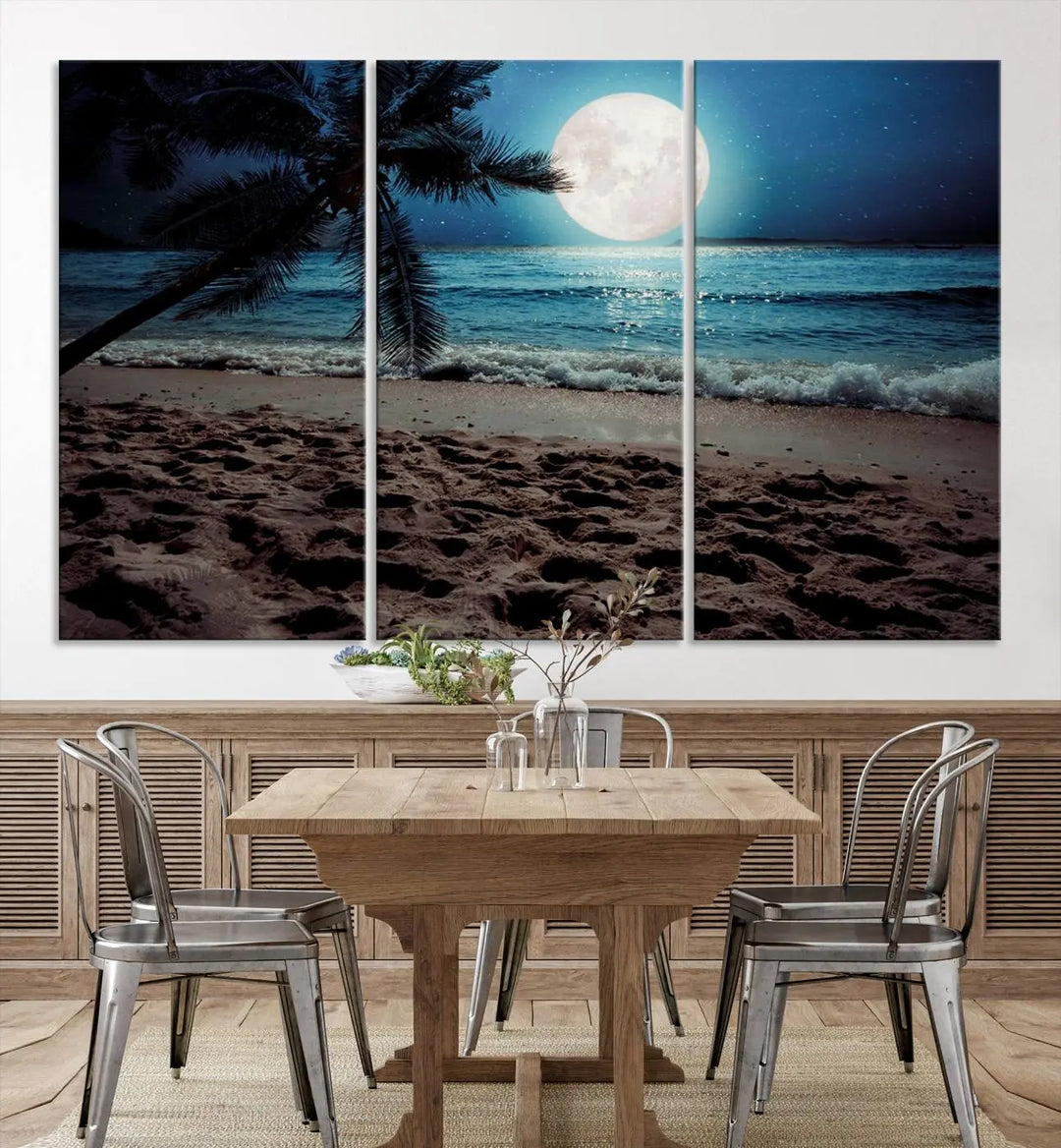 The living room features the Moonglade Coastal Palm Tree Wall Art Canvas Print adorning the wall. This triptych showcases palm trees and ocean waves on museum-quality canvases, enhanced with a UV-protective coating to maintain its vibrant colors.