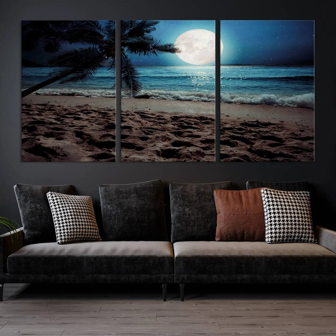 The living room features the Moonglade Coastal Palm Tree Wall Art Canvas Print adorning the wall. This triptych showcases palm trees and ocean waves on museum-quality canvases, enhanced with a UV-protective coating to maintain its vibrant colors.