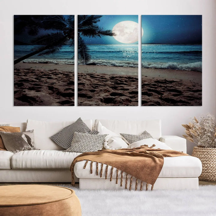 The living room features the Moonglade Coastal Palm Tree Wall Art Canvas Print adorning the wall. This triptych showcases palm trees and ocean waves on museum-quality canvases, enhanced with a UV-protective coating to maintain its vibrant colors.