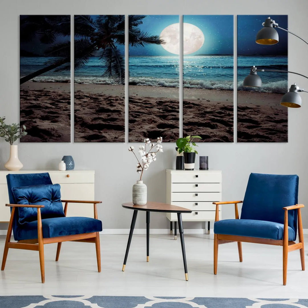 The living room features the Moonglade Coastal Palm Tree Wall Art Canvas Print adorning the wall. This triptych showcases palm trees and ocean waves on museum-quality canvases, enhanced with a UV-protective coating to maintain its vibrant colors.