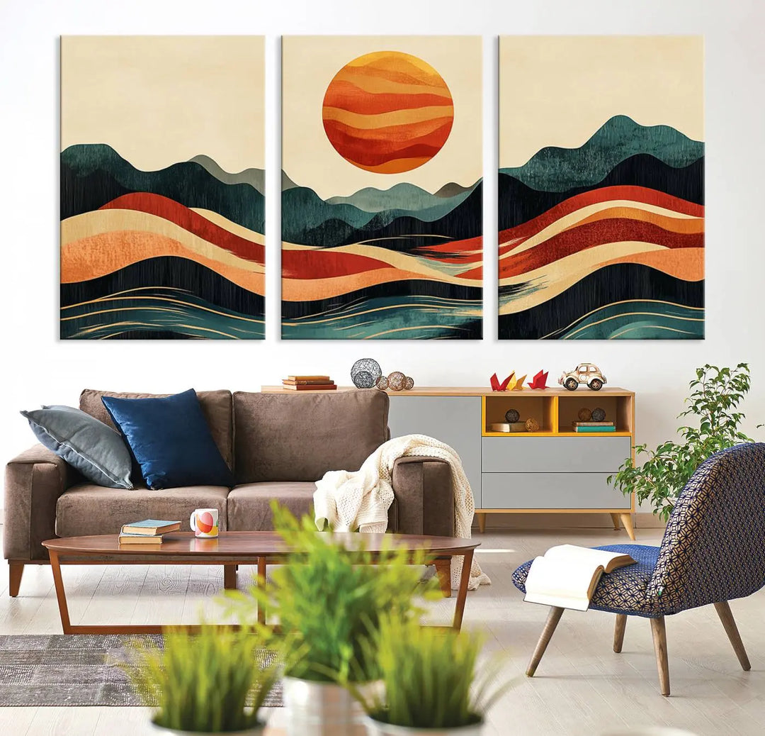 Enhance your contemporary kitchen with the "Mountain Triptych Wall Art - Western Nature Prints." This framed boho canvas depicts an abstract landscape featuring an orange sun rising over stylized mountains and wavy lines, all crafted with a gallery-quality finish for a striking visual impact.