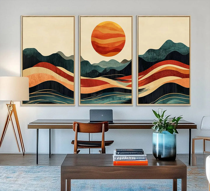 Enhance your contemporary kitchen with the "Mountain Triptych Wall Art - Western Nature Prints." This framed boho canvas depicts an abstract landscape featuring an orange sun rising over stylized mountains and wavy lines, all crafted with a gallery-quality finish for a striking visual impact.