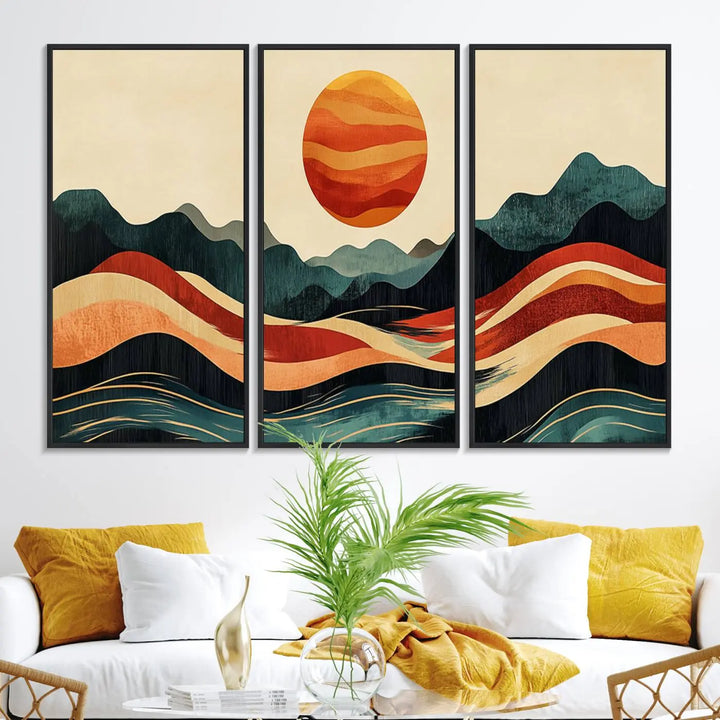 Enhance your contemporary kitchen with the "Mountain Triptych Wall Art - Western Nature Prints." This framed boho canvas depicts an abstract landscape featuring an orange sun rising over stylized mountains and wavy lines, all crafted with a gallery-quality finish for a striking visual impact.