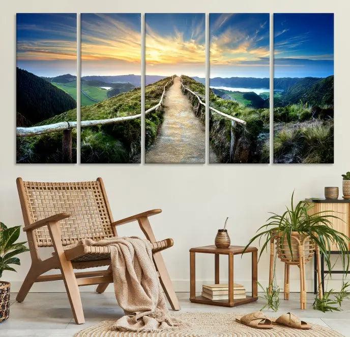 The Mountain Way Wall Art Canvas Print features a triptych of a sunrise over a mountain path. The artwork is gallery wrapped on museum-quality canvas, ensuring every detail shines through with stunning clarity and depth.