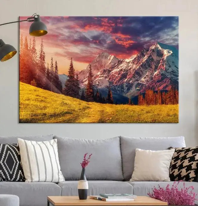 The "Mountain and Daylight Red Sunset Wall Art Canvas Print," featuring three panels of a mountain landscape at sunset, graces the wall with its vibrant depiction. Printed on museum-quality canvas with UV-protective coating, this ready-to-hang piece can effortlessly transform any living space into an artistic sanctuary.