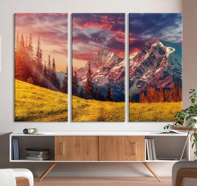 The "Mountain and Daylight Red Sunset Wall Art Canvas Print," featuring three panels of a mountain landscape at sunset, graces the wall with its vibrant depiction. Printed on museum-quality canvas with UV-protective coating, this ready-to-hang piece can effortlessly transform any living space into an artistic sanctuary.