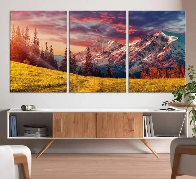 The "Mountain and Daylight Red Sunset Wall Art Canvas Print," featuring three panels of a mountain landscape at sunset, graces the wall with its vibrant depiction. Printed on museum-quality canvas with UV-protective coating, this ready-to-hang piece can effortlessly transform any living space into an artistic sanctuary.