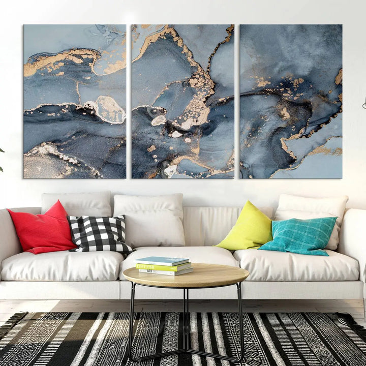 The wall is graced by the "Multipanel Marble Fluid Effect Wall Art Abstract Canvas Wall Art Print." These museum-quality canvases come with a UV-protective coating to ensure their longevity and include the convenience of free shipping.