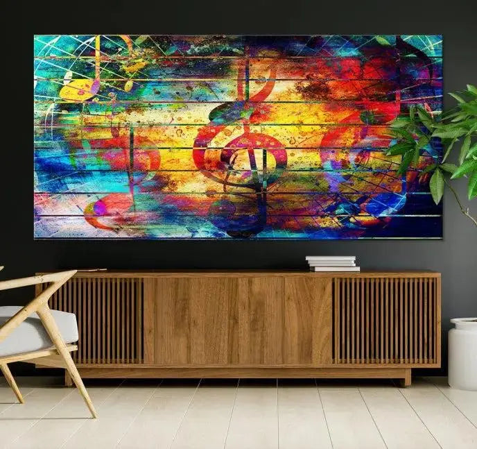 The Music Left Switch Abstract Wall Art Canvas Print features three panels of vibrant colors and music notes. Crafted on museum-quality canvases with a UV-protective coating, it offers lasting elegance.