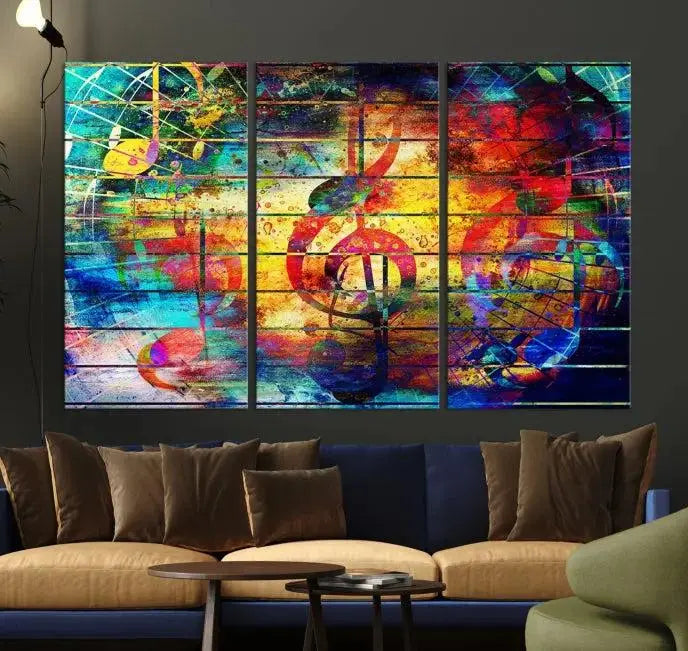 The Music Left Switch Abstract Wall Art Canvas Print features three panels of vibrant colors and music notes. Crafted on museum-quality canvases with a UV-protective coating, it offers lasting elegance.