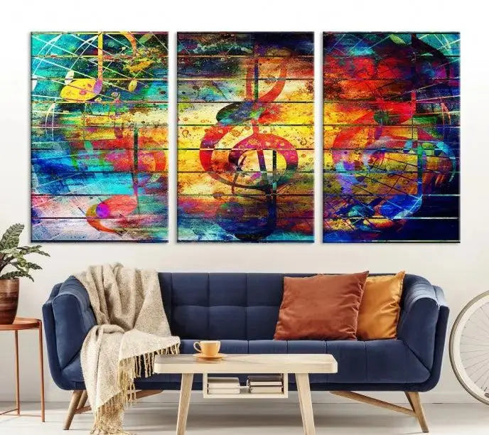 The Music Left Switch Abstract Wall Art Canvas Print features three panels of vibrant colors and music notes. Crafted on museum-quality canvases with a UV-protective coating, it offers lasting elegance.