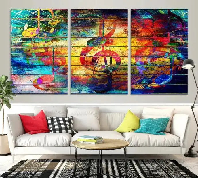 The Music Left Switch Abstract Wall Art Canvas Print features three panels of vibrant colors and music notes. Crafted on museum-quality canvases with a UV-protective coating, it offers lasting elegance.