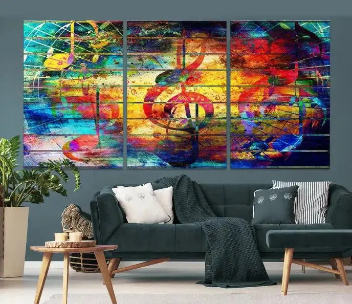 The Music Left Switch Abstract Wall Art Canvas Print features three panels of vibrant colors and music notes. Crafted on museum-quality canvases with a UV-protective coating, it offers lasting elegance.