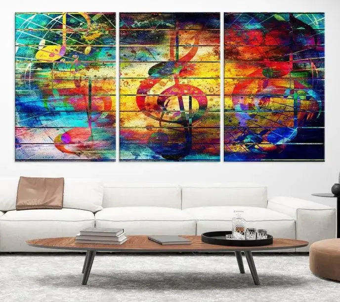 The Music Left Switch Abstract Wall Art Canvas Print features three panels of vibrant colors and music notes. Crafted on museum-quality canvases with a UV-protective coating, it offers lasting elegance.