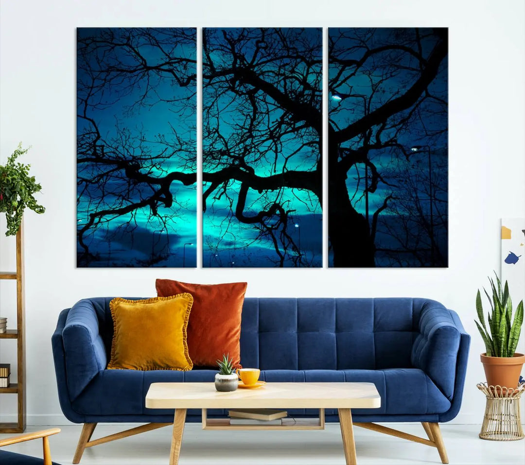 The Mystic Dark Forest Tree Wall Art Canvas Print showcases a tree silhouette set against a teal sky. Crafted on museum-quality canvas and gallery wrapped, it includes a UV-protective coating for lasting vibrancy.