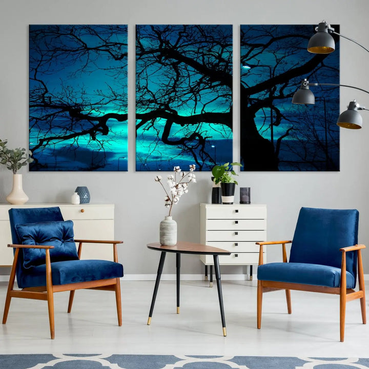 The Mystic Dark Forest Tree Wall Art Canvas Print showcases a tree silhouette set against a teal sky. Crafted on museum-quality canvas and gallery wrapped, it includes a UV-protective coating for lasting vibrancy.