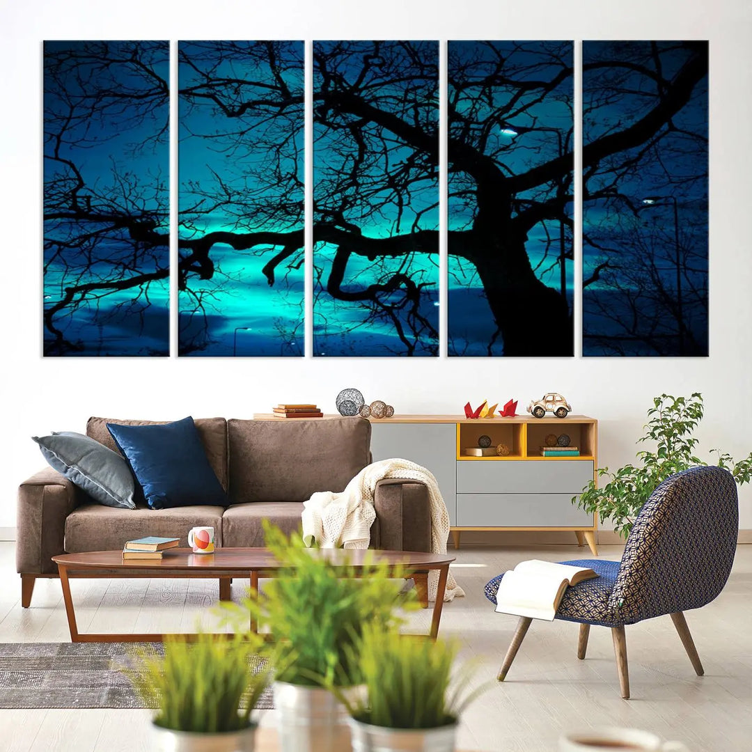 The Mystic Dark Forest Tree Wall Art Canvas Print showcases a tree silhouette set against a teal sky. Crafted on museum-quality canvas and gallery wrapped, it includes a UV-protective coating for lasting vibrancy.