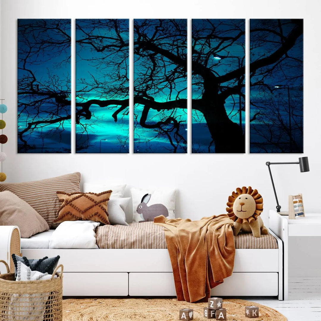 The Mystic Dark Forest Tree Wall Art Canvas Print showcases a tree silhouette set against a teal sky. Crafted on museum-quality canvas and gallery wrapped, it includes a UV-protective coating for lasting vibrancy.