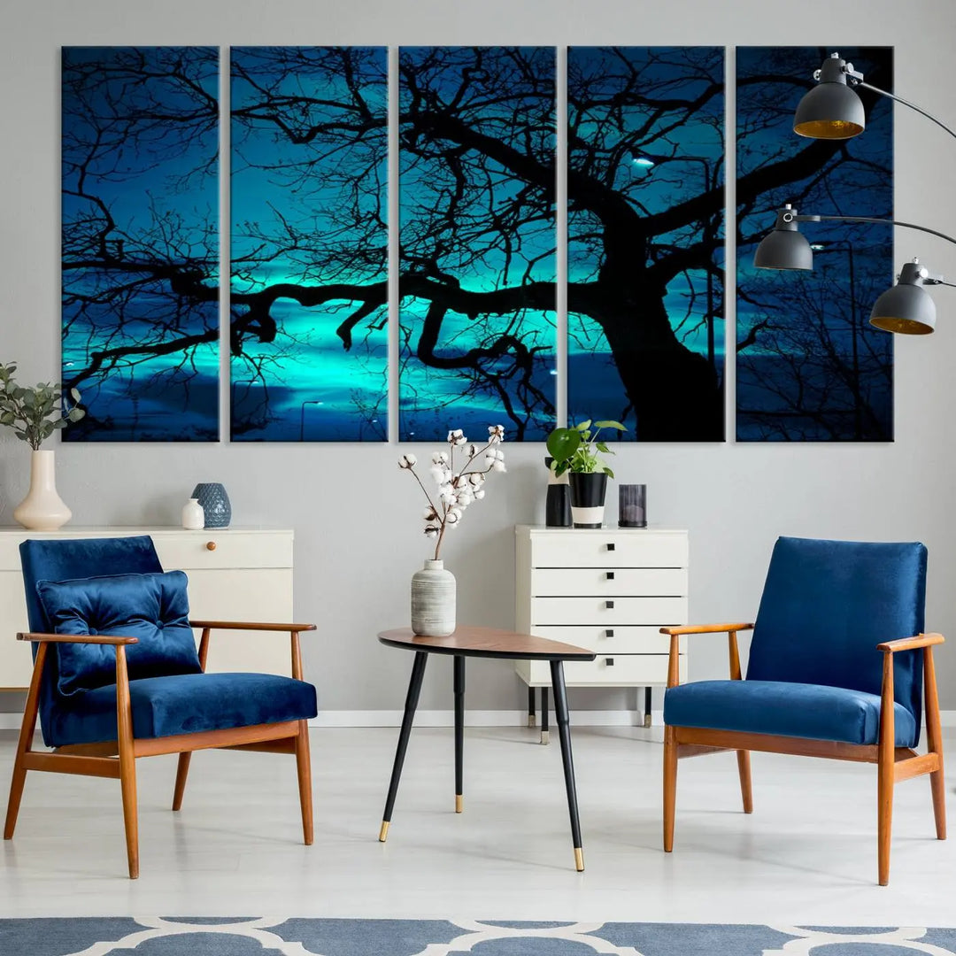 The Mystic Dark Forest Tree Wall Art Canvas Print showcases a tree silhouette set against a teal sky. Crafted on museum-quality canvas and gallery wrapped, it includes a UV-protective coating for lasting vibrancy.