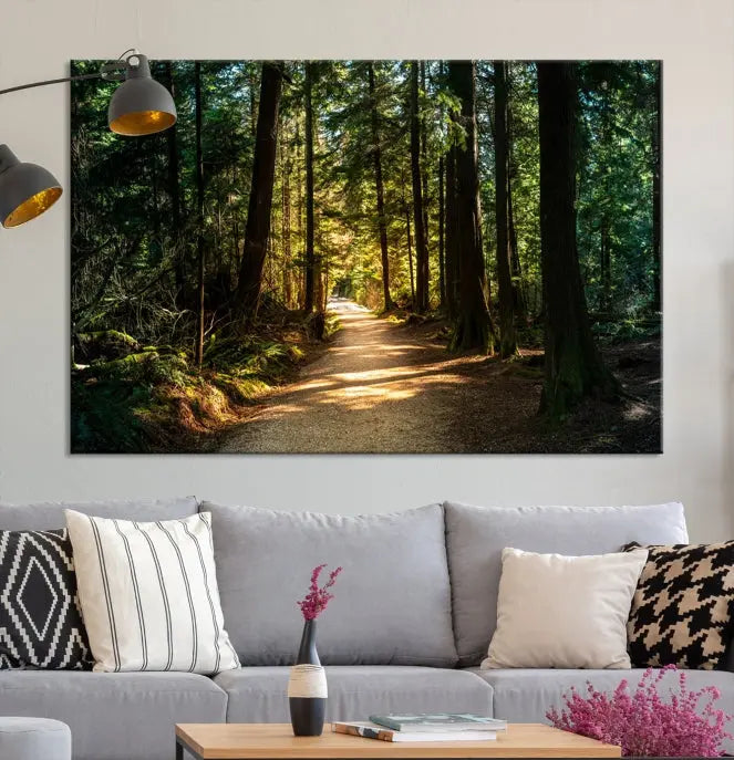 The Natural Landscape Wall Art Relaxing Forest Canvas Print features a triptych design showcasing a sunlit forest path, printed on premium museum-quality canvas with UV-protective coating. This beautiful artwork offers an oasis of tranquility and enhances your space. Enjoy free shipping on this stunning piece.