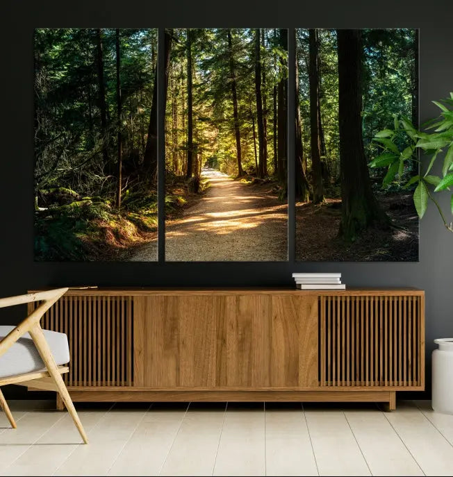 The Natural Landscape Wall Art Relaxing Forest Canvas Print features a triptych design showcasing a sunlit forest path, printed on premium museum-quality canvas with UV-protective coating. This beautiful artwork offers an oasis of tranquility and enhances your space. Enjoy free shipping on this stunning piece.