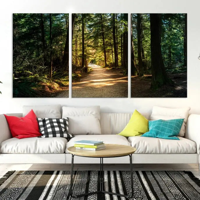 The Natural Landscape Wall Art Relaxing Forest Canvas Print features a triptych design showcasing a sunlit forest path, printed on premium museum-quality canvas with UV-protective coating. This beautiful artwork offers an oasis of tranquility and enhances your space. Enjoy free shipping on this stunning piece.