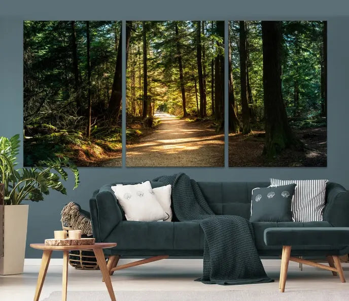 The Natural Landscape Wall Art Relaxing Forest Canvas Print features a triptych design showcasing a sunlit forest path, printed on premium museum-quality canvas with UV-protective coating. This beautiful artwork offers an oasis of tranquility and enhances your space. Enjoy free shipping on this stunning piece.