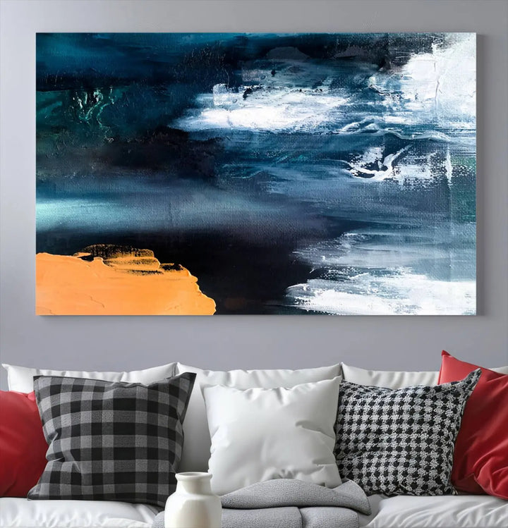 The stunning Nautical Abstract Ocean Canvas Wall Art Print in blue, white, and a touch of orange on museum-quality canvas.