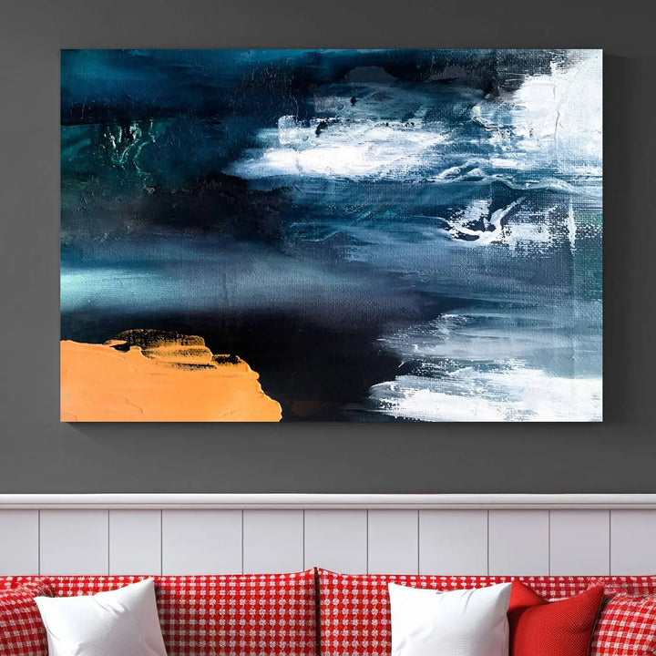 The stunning Nautical Abstract Ocean Canvas Wall Art Print in blue, white, and a touch of orange on museum-quality canvas.