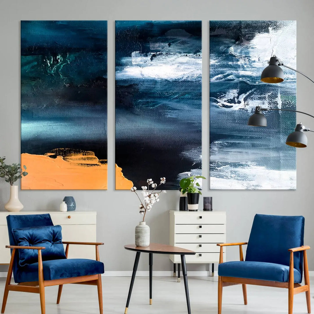 The stunning Nautical Abstract Ocean Canvas Wall Art Print in blue, white, and a touch of orange on museum-quality canvas.