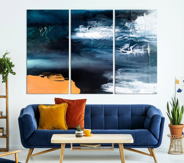 The stunning Nautical Abstract Ocean Canvas Wall Art Print in blue, white, and a touch of orange on museum-quality canvas.