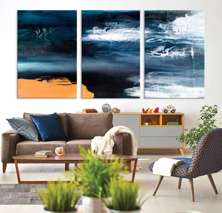 The stunning Nautical Abstract Ocean Canvas Wall Art Print in blue, white, and a touch of orange on museum-quality canvas.