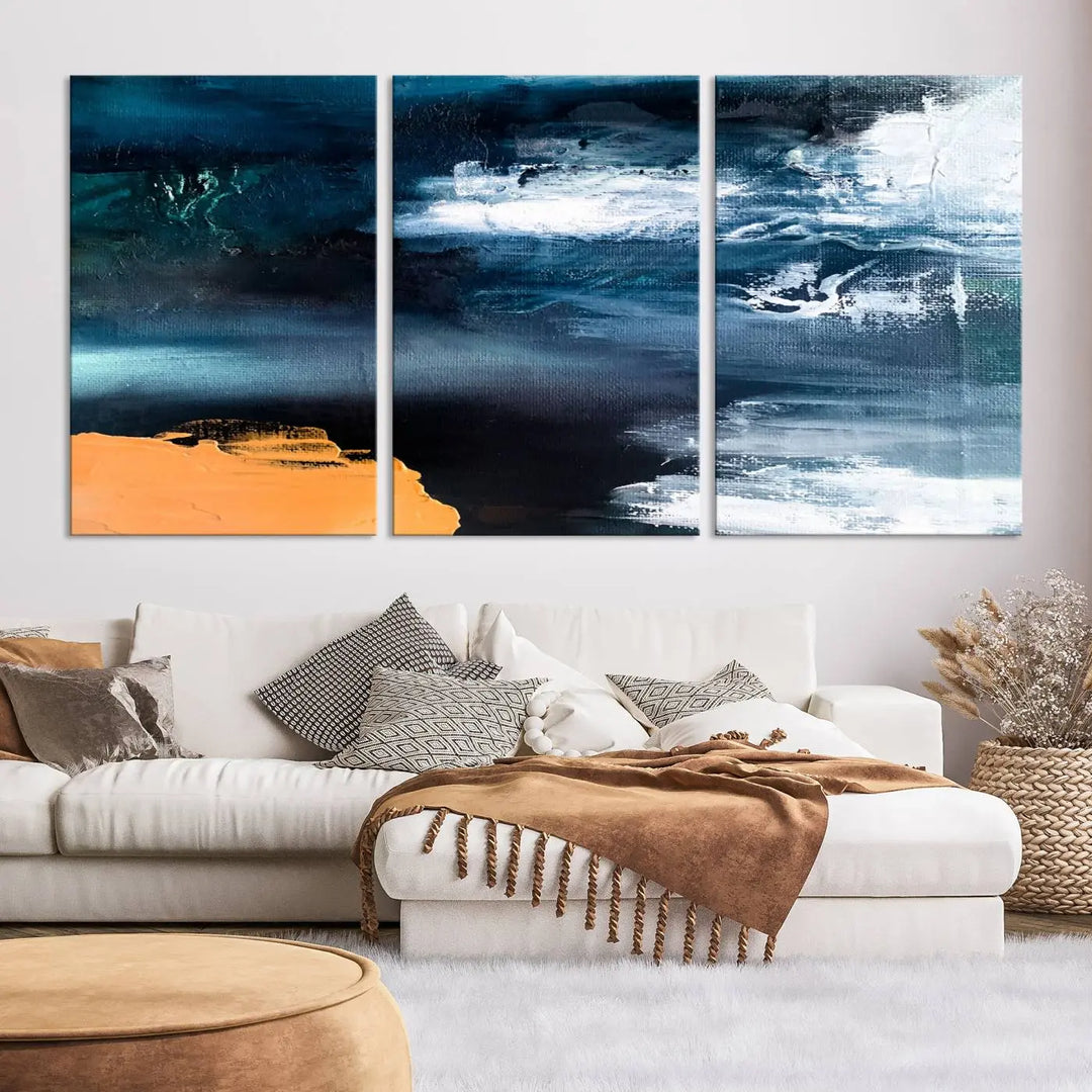 The stunning Nautical Abstract Ocean Canvas Wall Art Print in blue, white, and a touch of orange on museum-quality canvas.