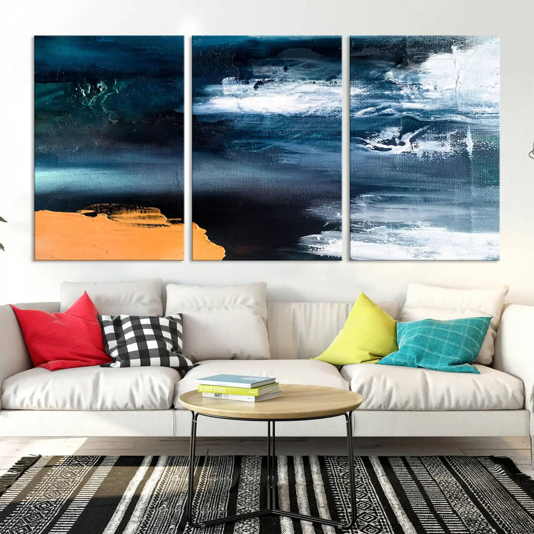 The stunning Nautical Abstract Ocean Canvas Wall Art Print in blue, white, and a touch of orange on museum-quality canvas.