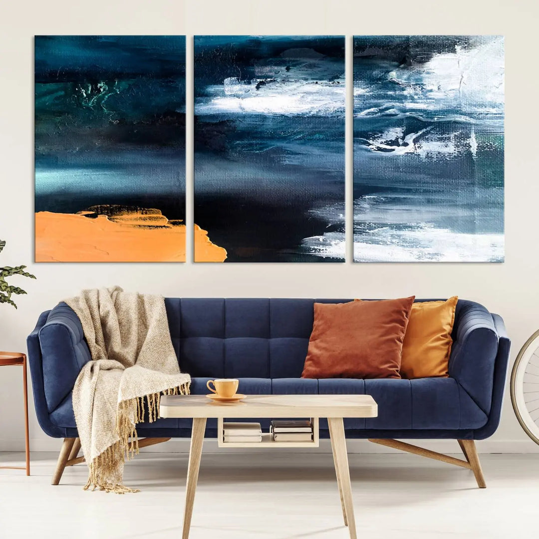 The stunning Nautical Abstract Ocean Canvas Wall Art Print in blue, white, and a touch of orange on museum-quality canvas.