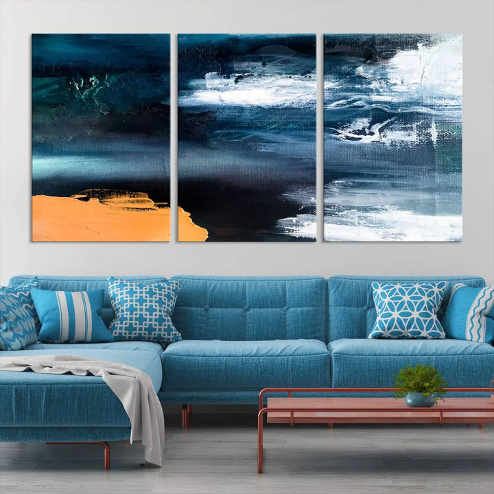 The stunning Nautical Abstract Ocean Canvas Wall Art Print in blue, white, and a touch of orange on museum-quality canvas.