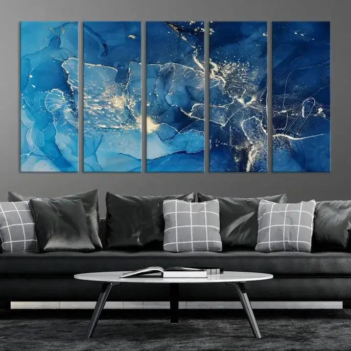 A modern living room features the "Navy Blue Marble Fluid Effect Wall Art Abstract Canvas Wall Art Print" above a white sofa. The museum-quality canvas adds an effortless touch of elegance.