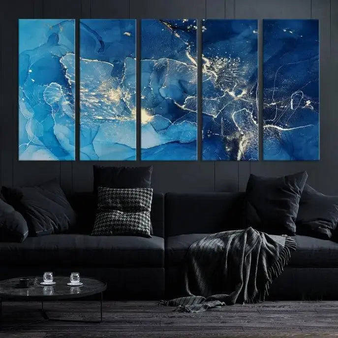 A modern living room features the "Navy Blue Marble Fluid Effect Wall Art Abstract Canvas Wall Art Print" above a white sofa. The museum-quality canvas adds an effortless touch of elegance.