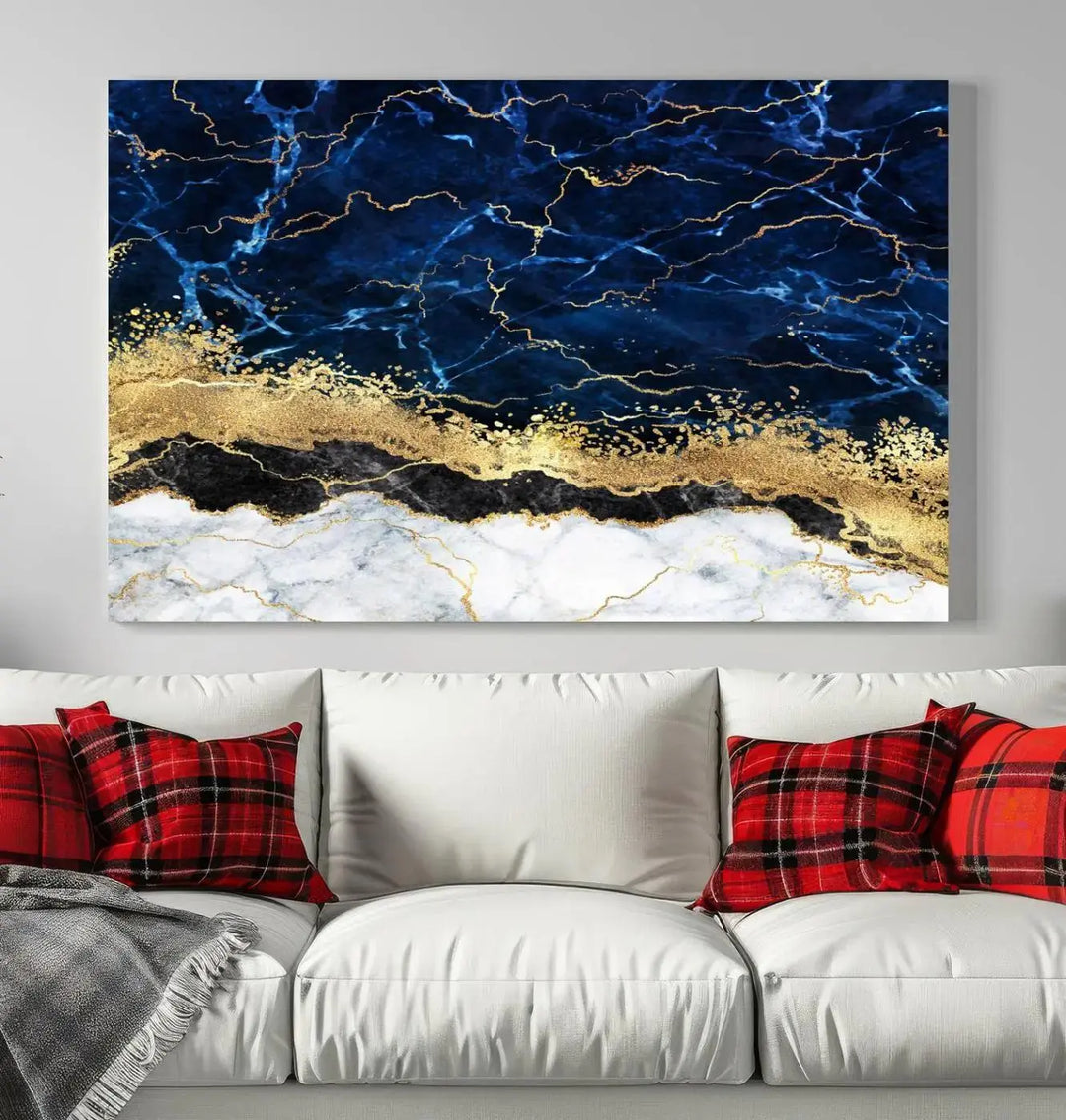 The living room is adorned with the Navy Blue Marble Fluid Effect Wall Art Abstract Canvas Wall Art Print. This ready-to-hang three-panel artwork features blue, gold, and white tones on museum-quality canvas with a UV-protective coating.