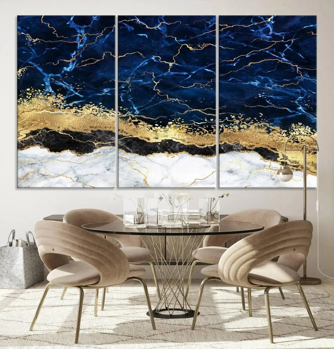 The living room is adorned with the Navy Blue Marble Fluid Effect Wall Art Abstract Canvas Wall Art Print. This ready-to-hang three-panel artwork features blue, gold, and white tones on museum-quality canvas with a UV-protective coating.