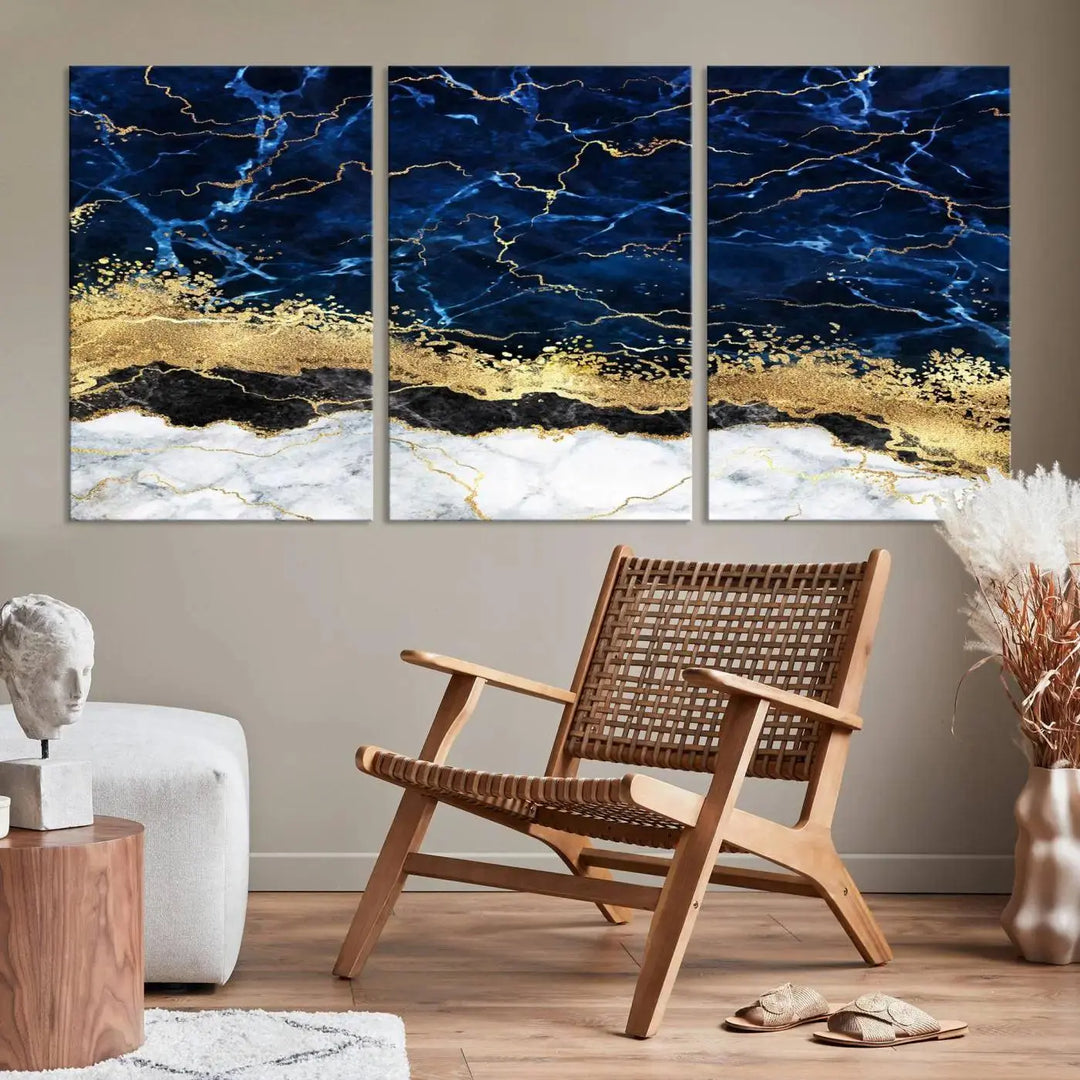 The living room is adorned with the Navy Blue Marble Fluid Effect Wall Art Abstract Canvas Wall Art Print. This ready-to-hang three-panel artwork features blue, gold, and white tones on museum-quality canvas with a UV-protective coating.