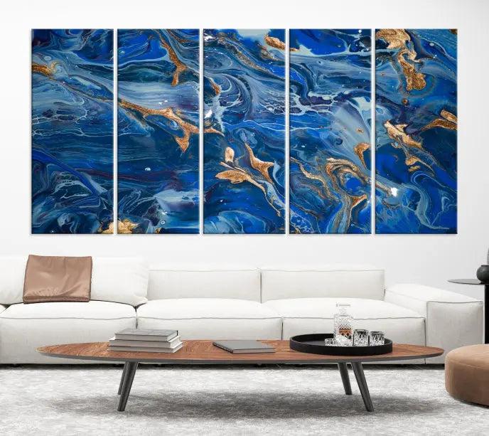 Adorn the space above your couch with the "Navy Blue Marble Fluid Effect Wall Art Abstract Canvas Wall Art Print," featuring exquisite blue and gold swirling patterns on museum-quality canvases.