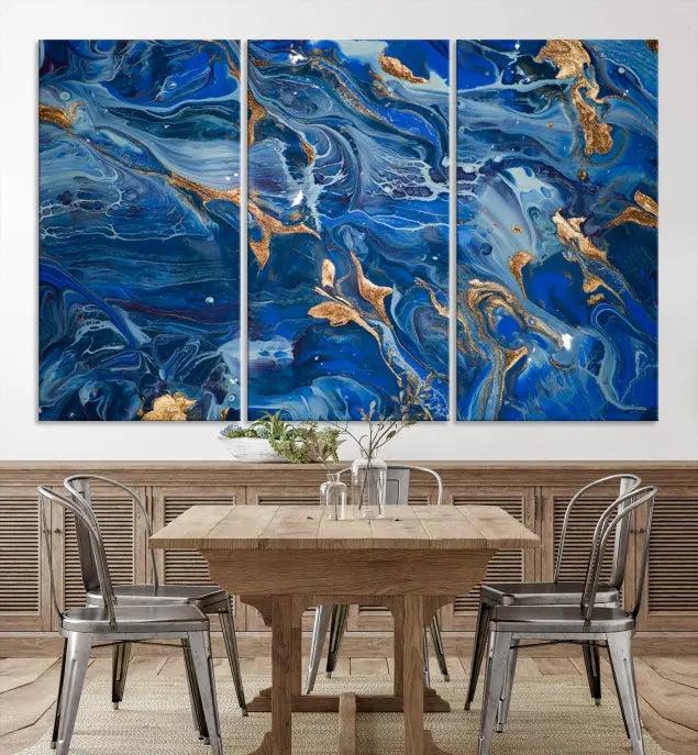 Adorn the space above your couch with the "Navy Blue Marble Fluid Effect Wall Art Abstract Canvas Wall Art Print," featuring exquisite blue and gold swirling patterns on museum-quality canvases.